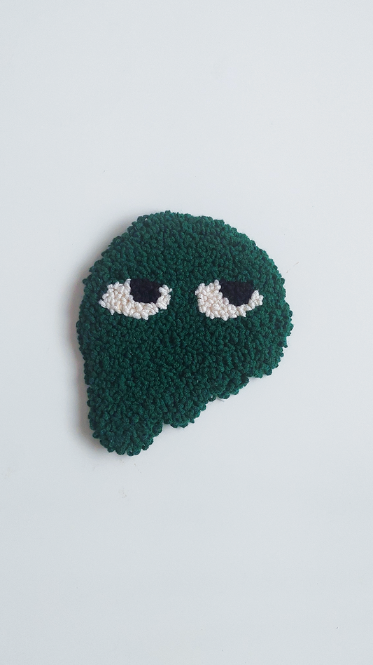 DARK GREEN MELTING FACE PUNCH COASTER