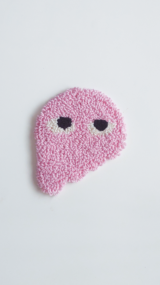 PINK MELTING FACE PUNCH COASTER