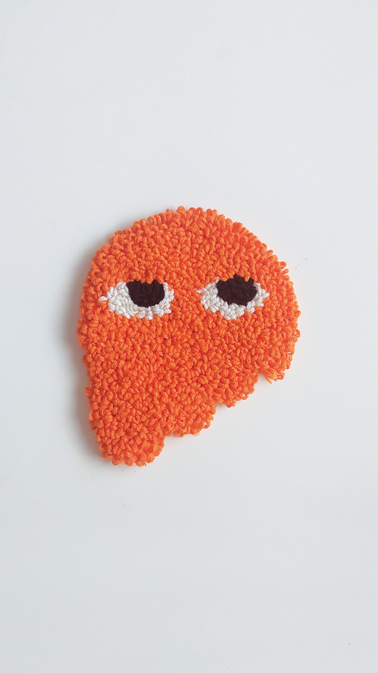 ORANGE MELTING FACE PUNCH COASTER